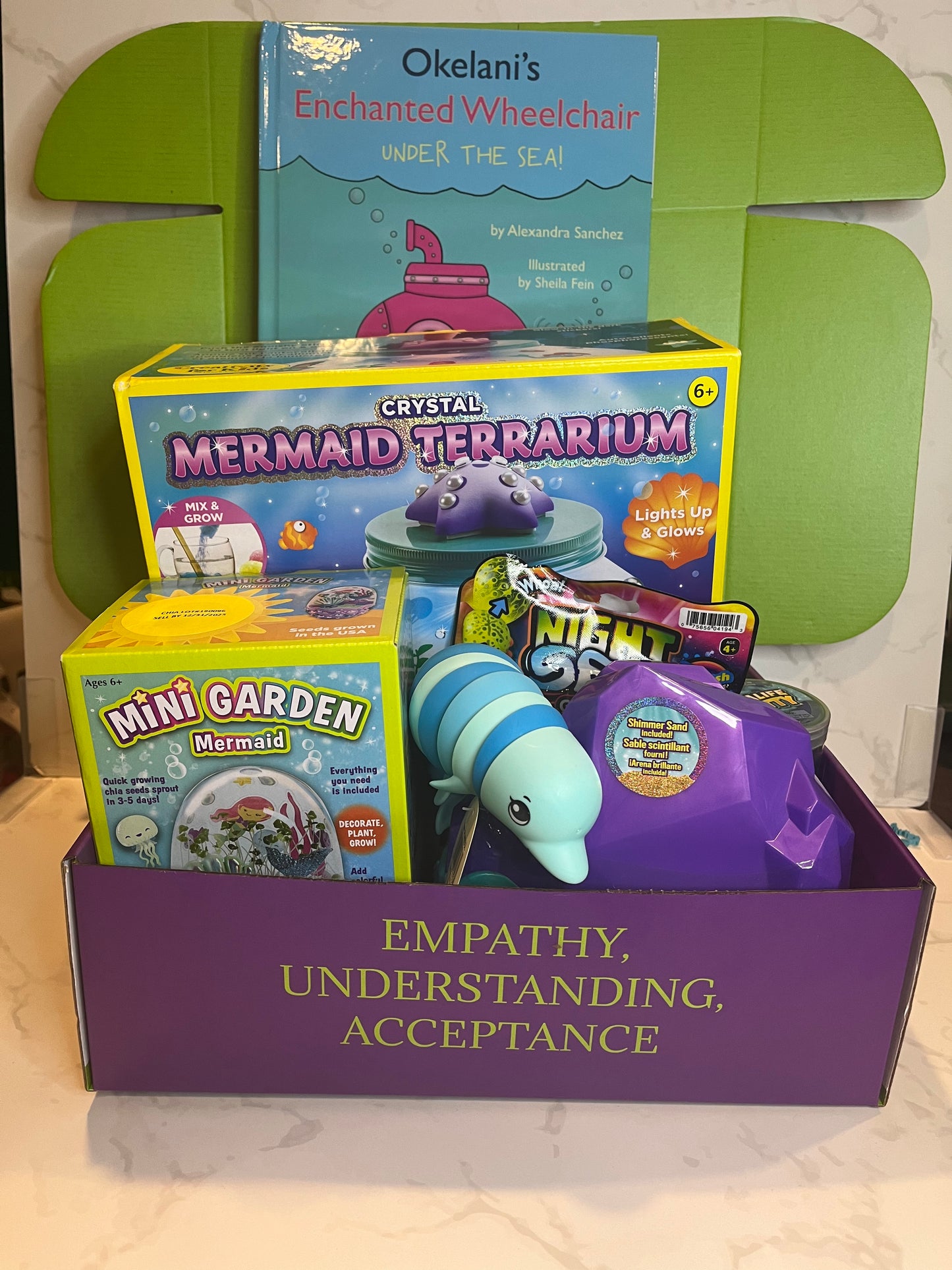 July 2024 Box - Okelani’s Enchanted Wheelchair Under the Sea